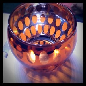 Two  orange votive candle holders